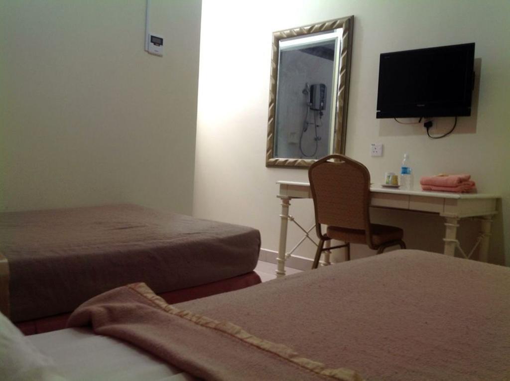 Hotel Morning Glory Kudat Værelse billede
